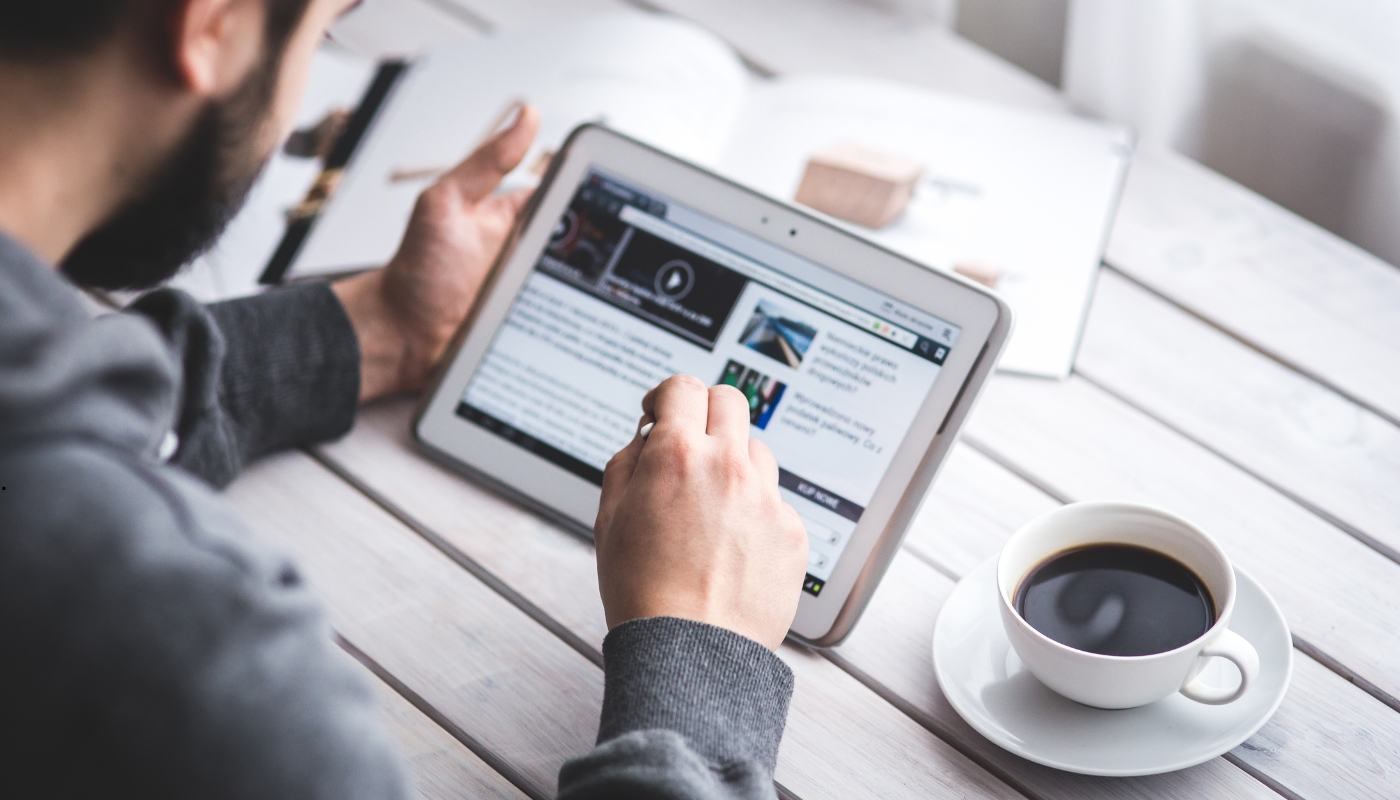 Business professionals analyzing futuristic digital marketing trends, AI tools, and data analytics representing the future of online marketing with MKTB.net